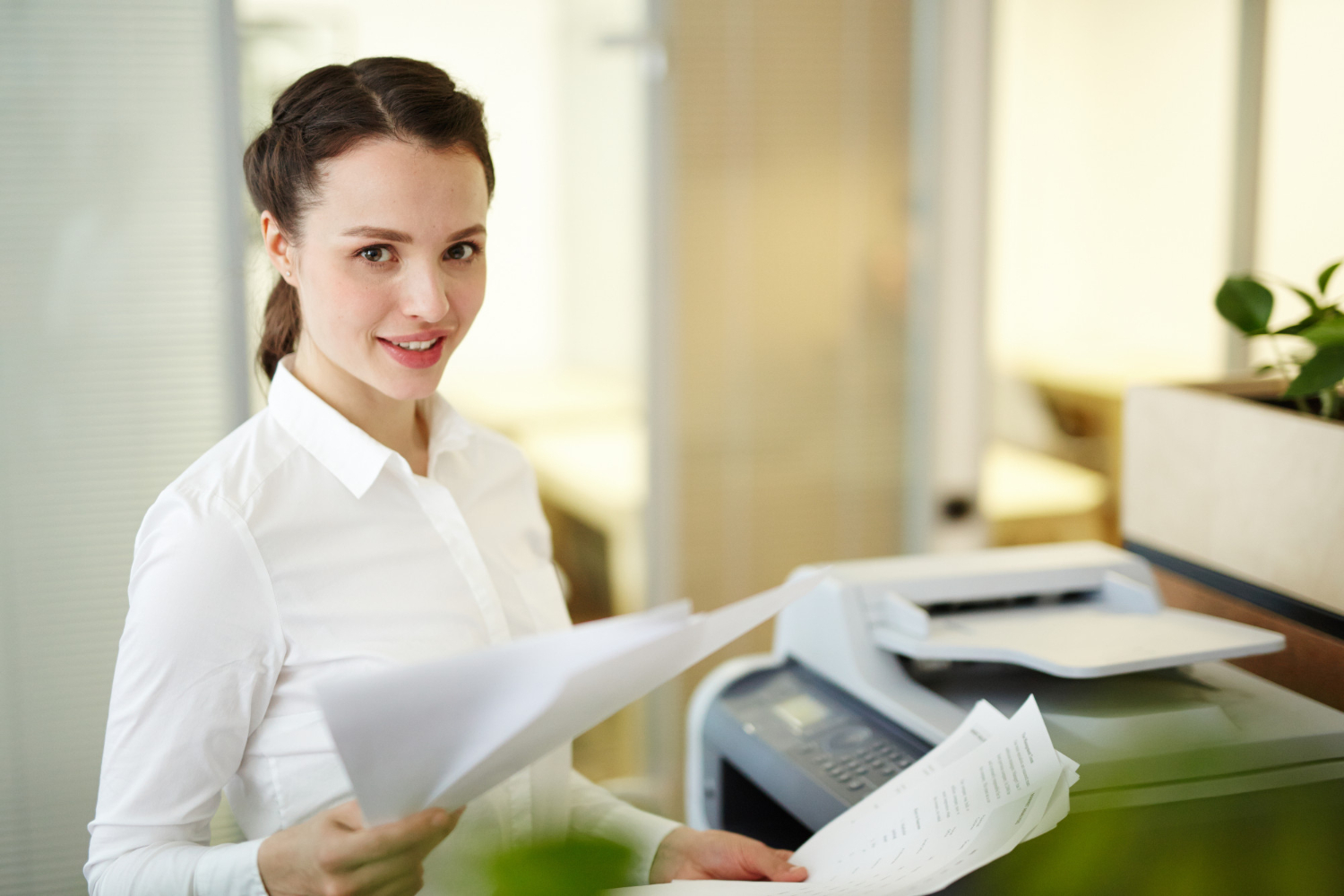 Efficient photocopier machine in an office.