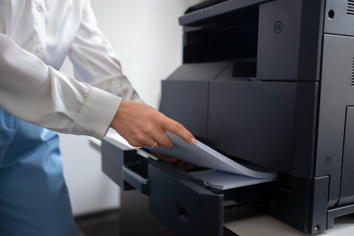 Modern scanner and photocopier in a business setting.