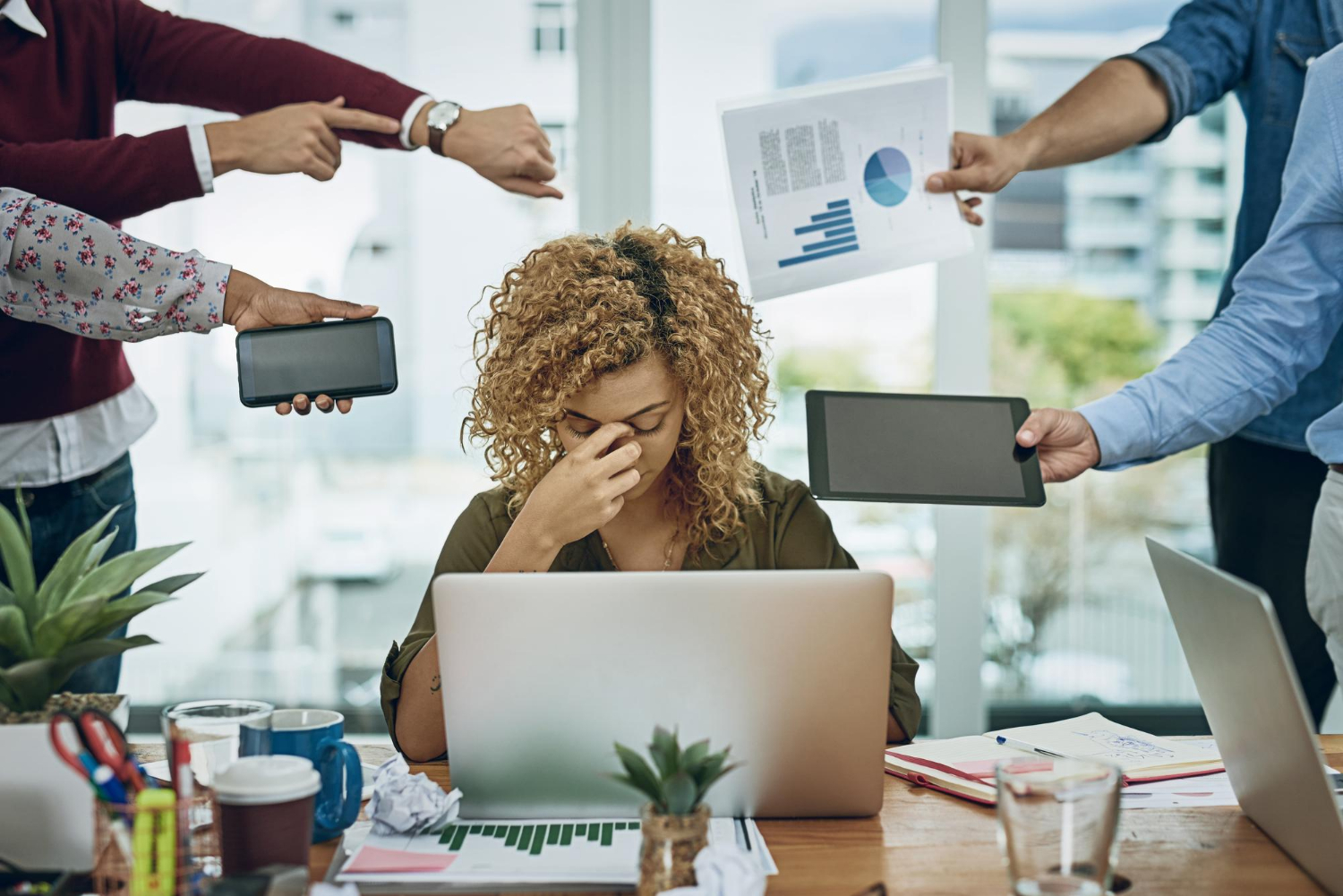 Stressed office worker finding a pathway through overwhelm strategies.