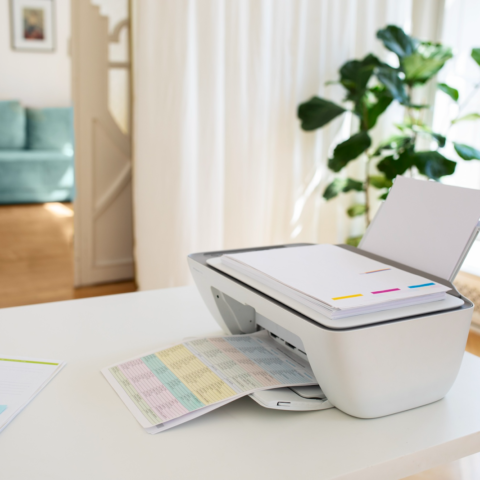 Office printer with recycled paper and eco-friendly ink cartridges